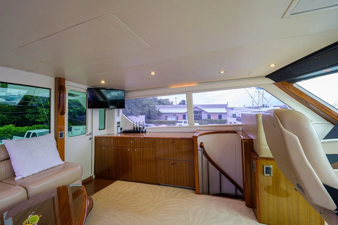 a room with a bed and a chair aboard KNOT RACING Yacht for Sale