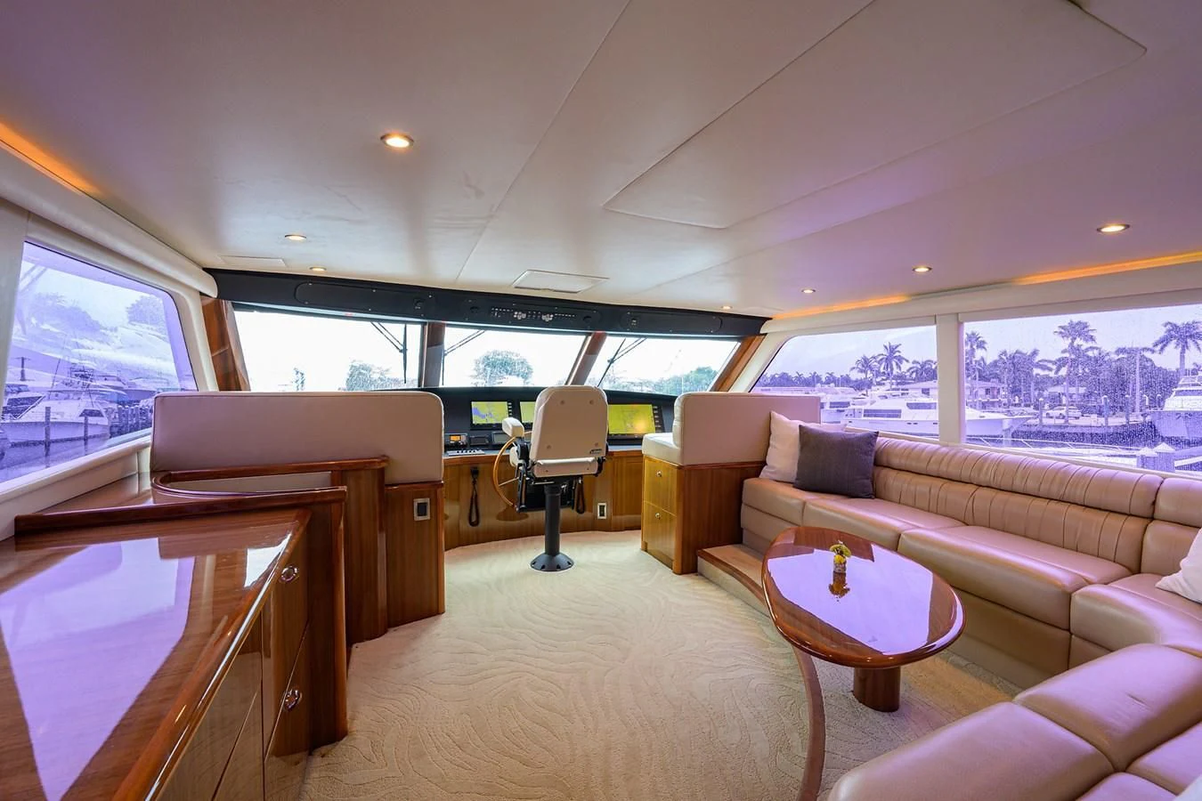 a living room with a couch and a table aboard KNOT RACING Yacht for Sale