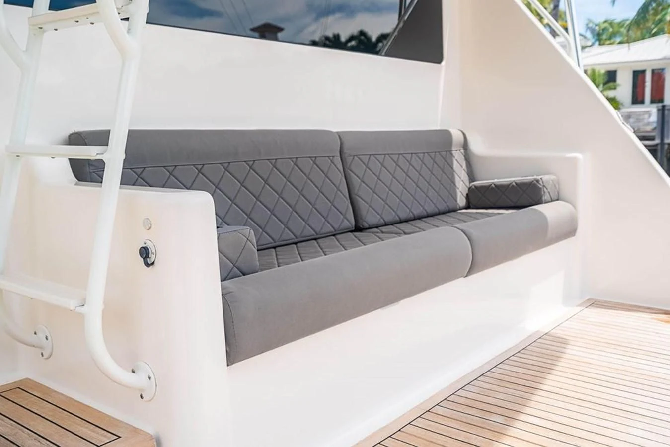 a white couch in a room aboard KNOT RACING Yacht for Sale