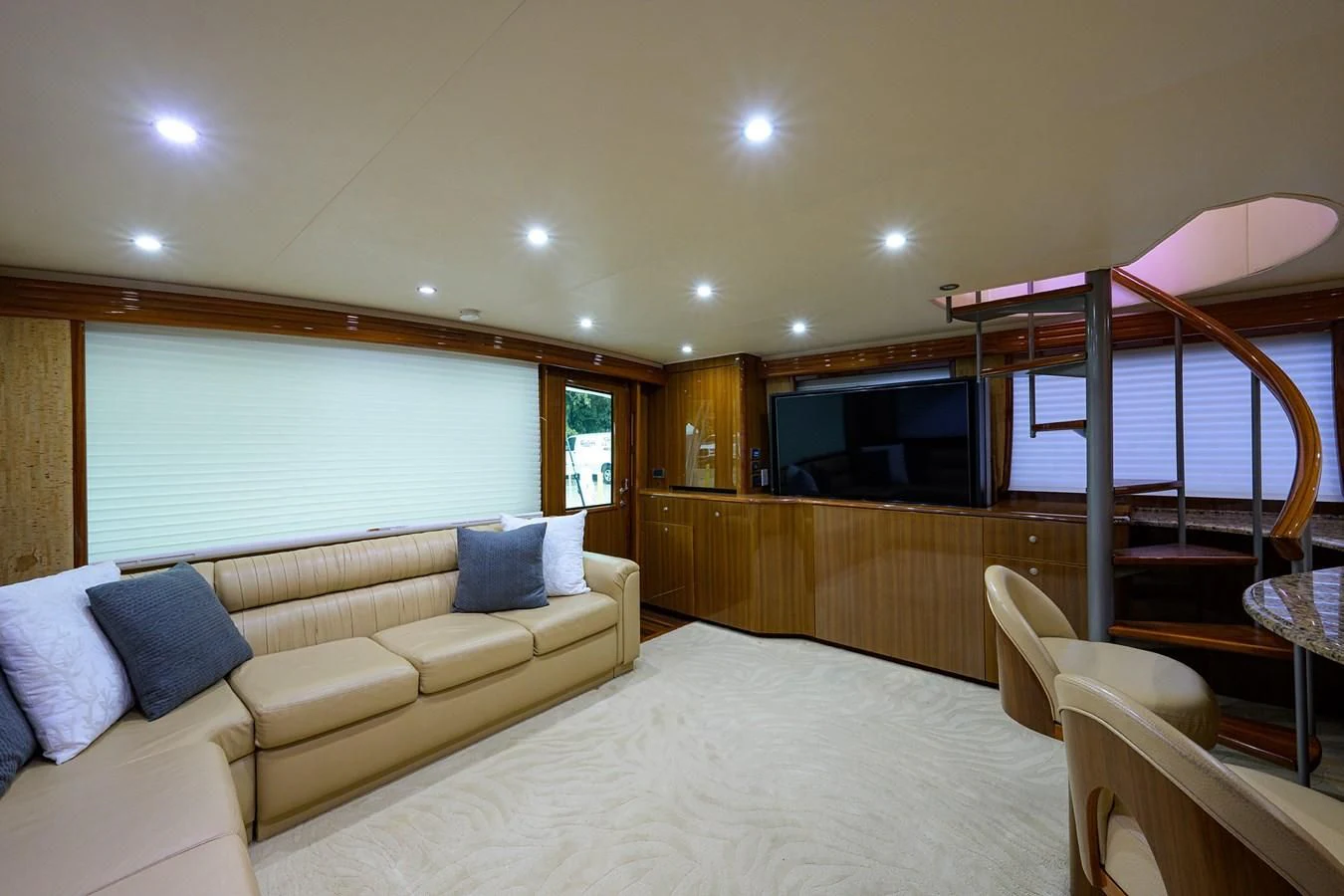a living room with a large bed aboard KNOT RACING Yacht for Sale