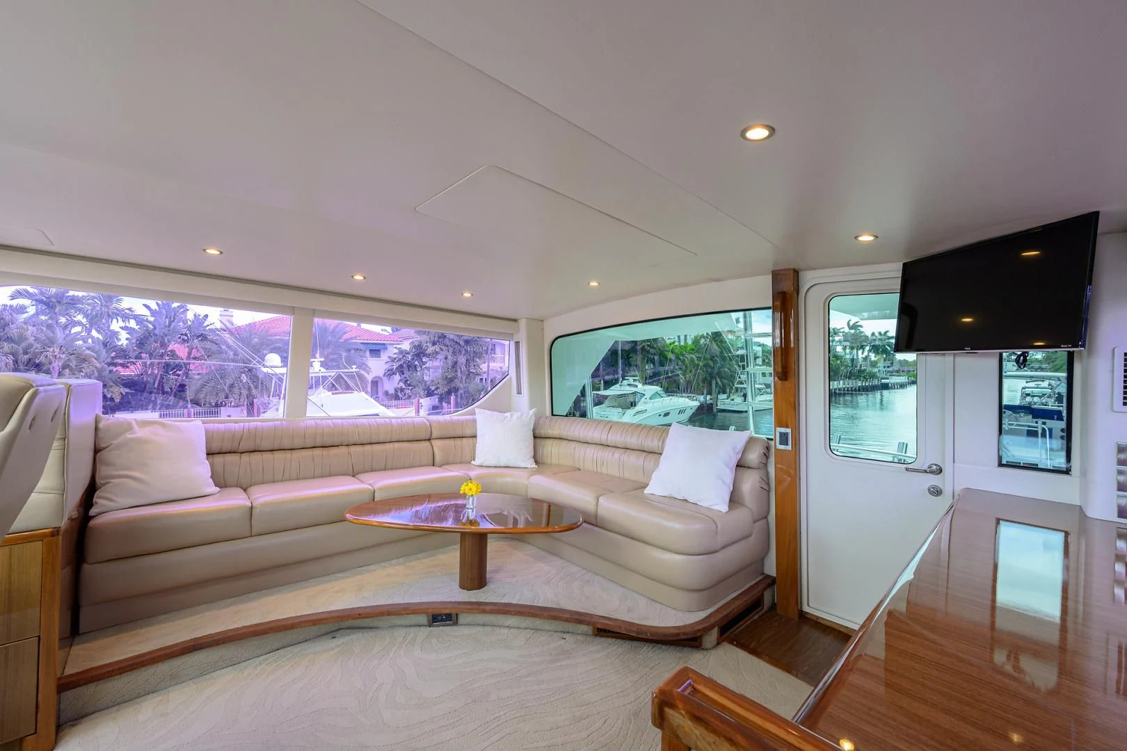 a living room with a couch and a table aboard KNOT RACING Yacht for Sale