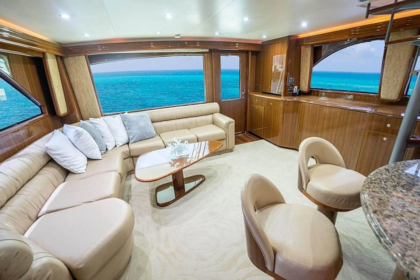 a large living room with a large window aboard KNOT RACING Yacht for Sale