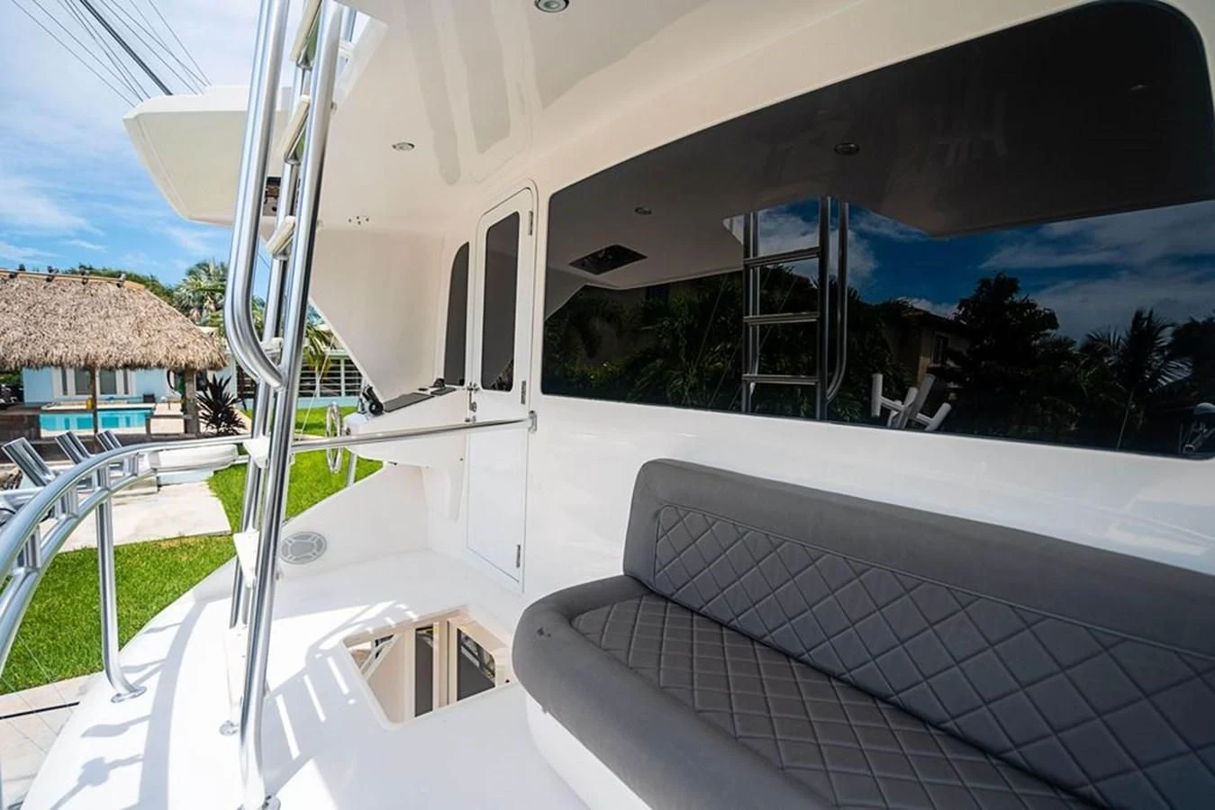 a white boat on a white surface aboard KNOT RACING Yacht for Sale