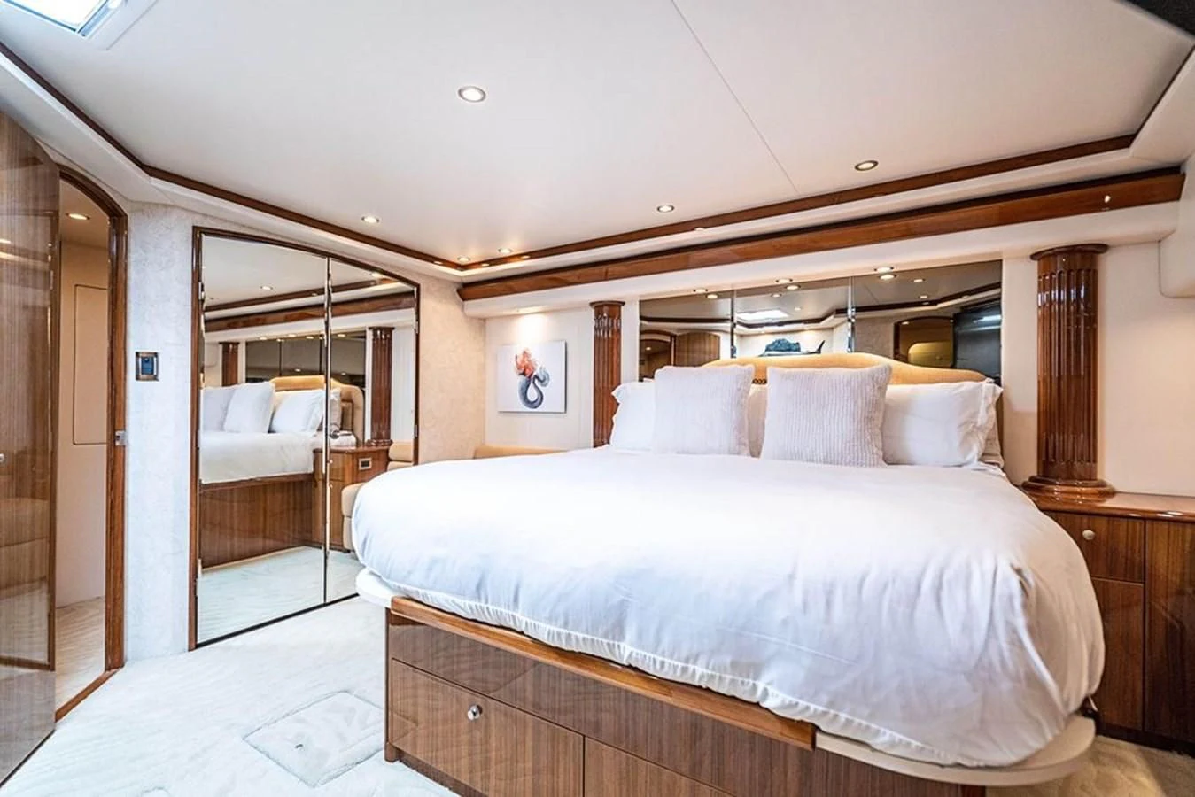 a bedroom with a large bed aboard KNOT RACING Yacht for Sale