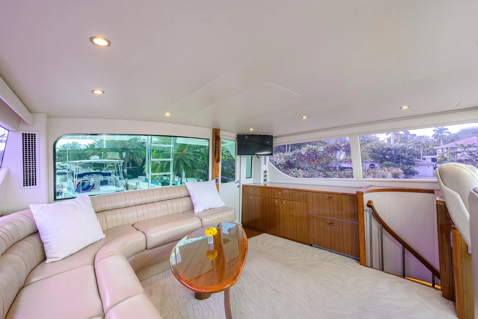 a large bedroom with a balcony aboard KNOT RACING Yacht for Sale