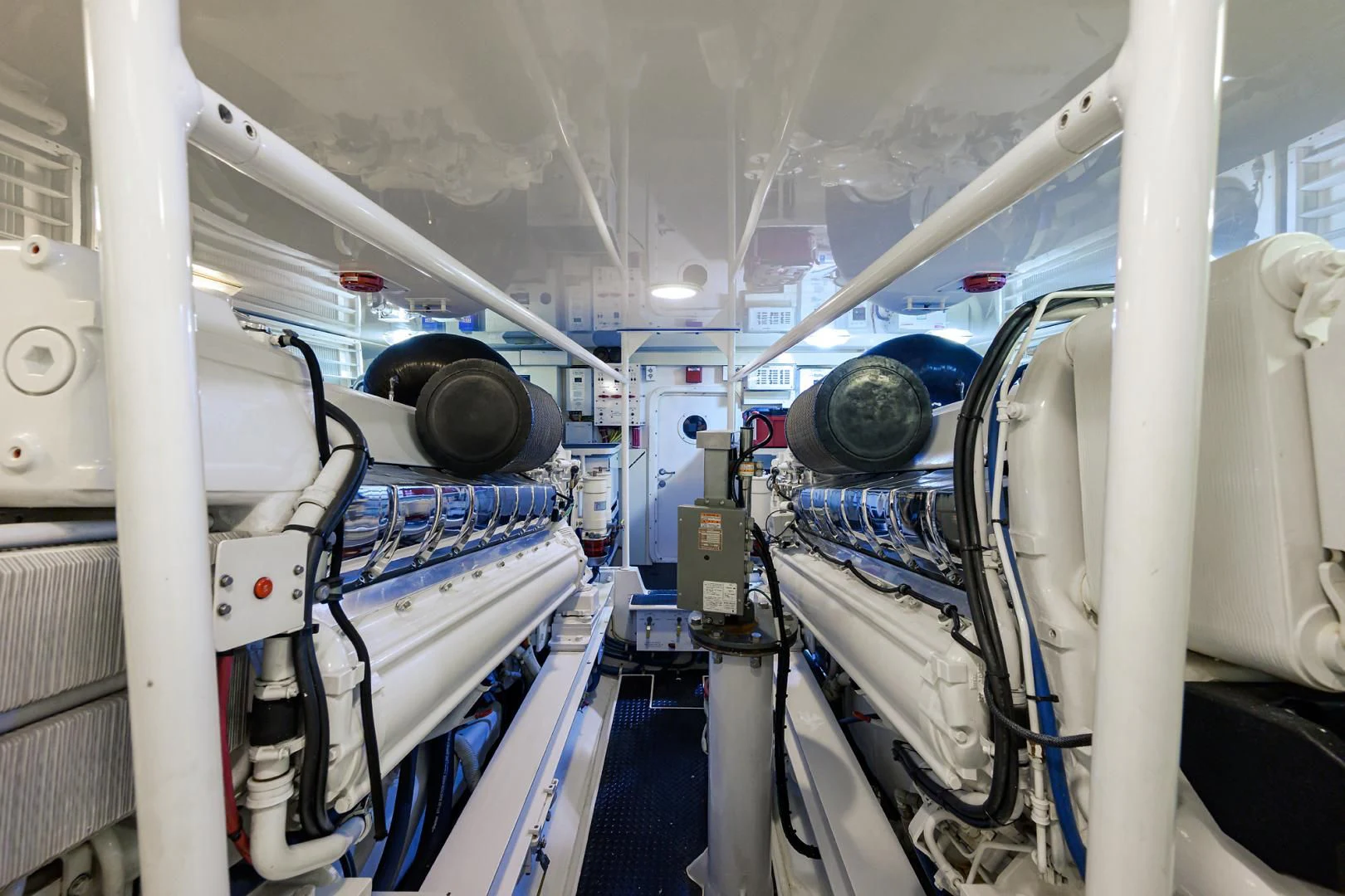 a large white machine with large wheels aboard KNOT RACING Yacht for Sale