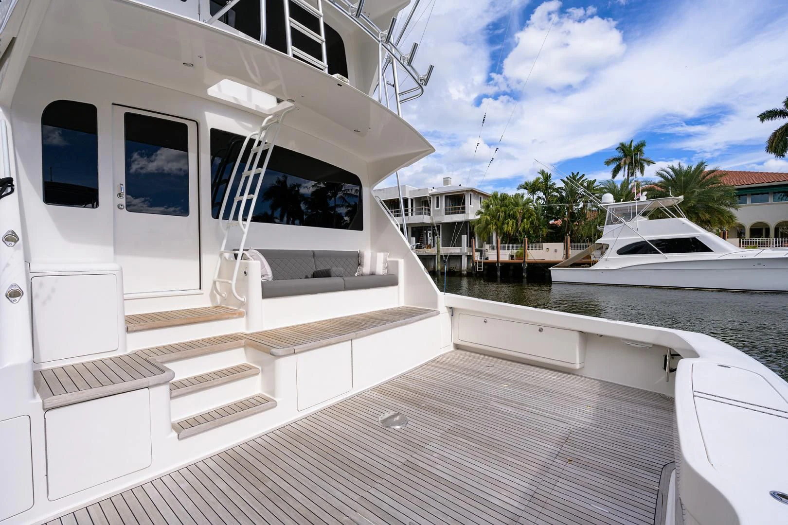 a deck with a boat and a dock aboard KNOT RACING Yacht for Sale