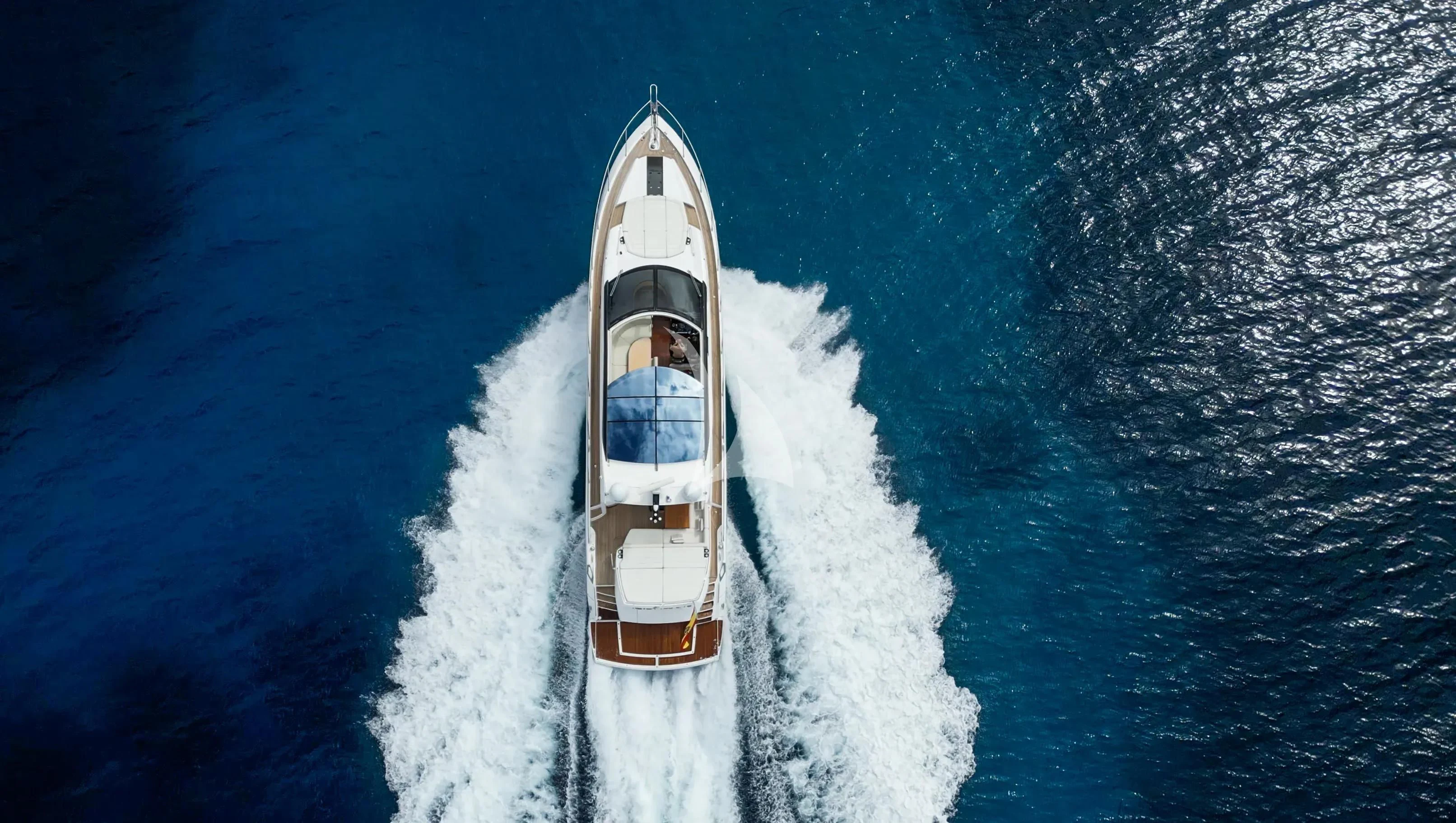 a boat in the water aboard NEVER TOO LATE Yacht for Charter