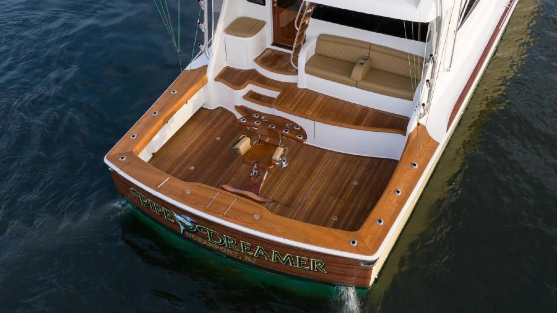 a boat on the water aboard NEVER TOO LATE Yacht for Charter