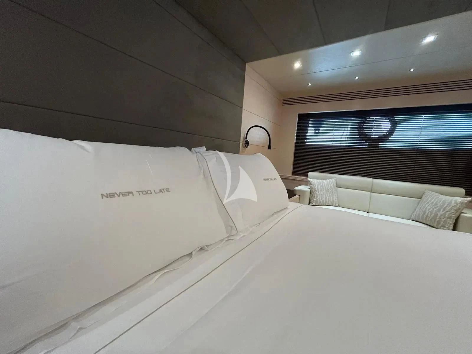 a couple of beds in a room aboard NEVER TOO LATE Yacht for Charter