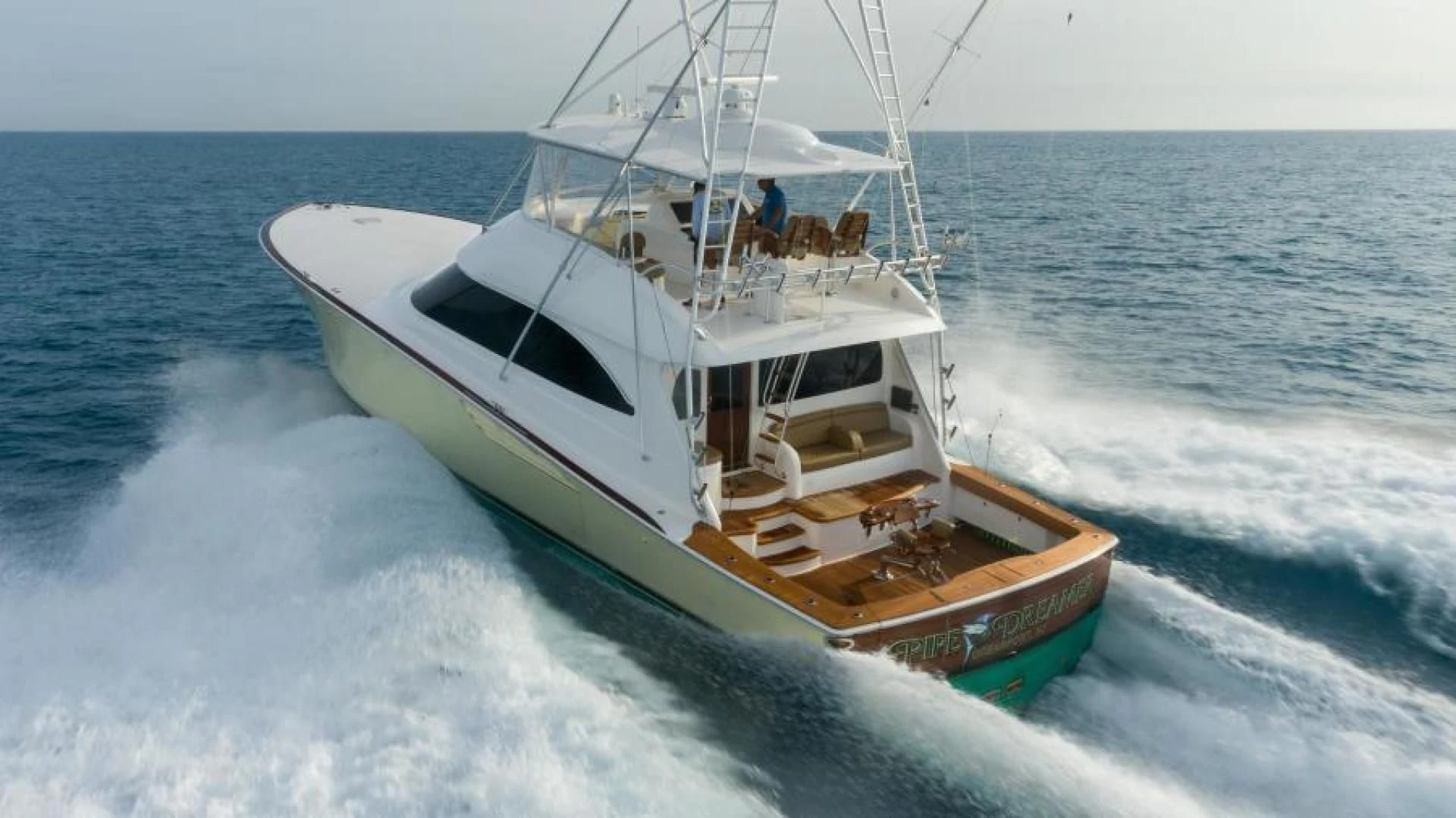 a boat on the water aboard NEVER TOO LATE Yacht for Charter