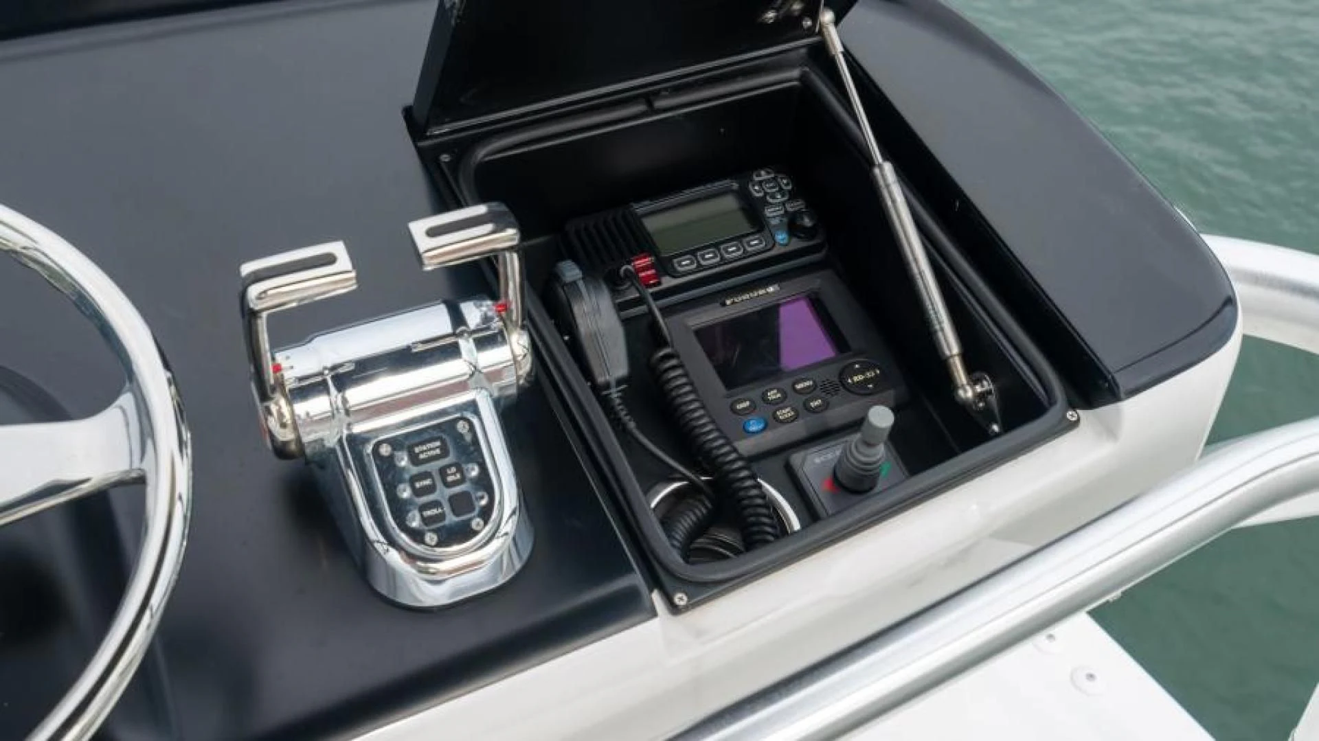 the inside of a car aboard NEVER TOO LATE Yacht for Charter