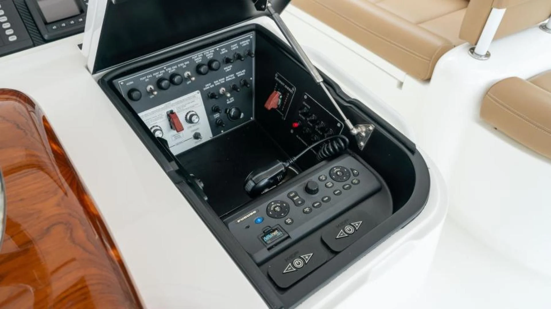 a black electronic device aboard NEVER TOO LATE Yacht for Charter