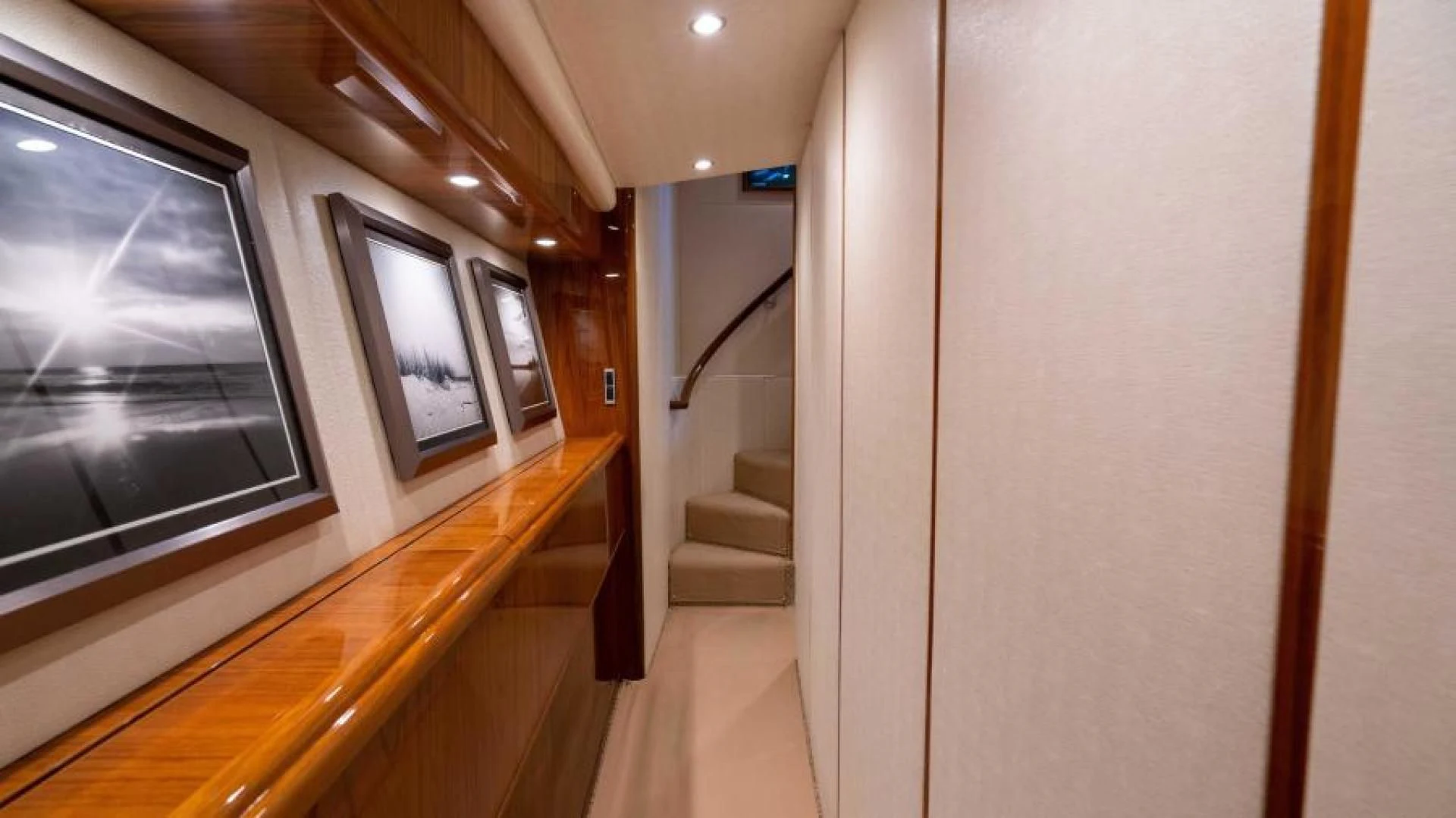 a hallway with a glass door aboard NEVER TOO LATE Yacht for Charter