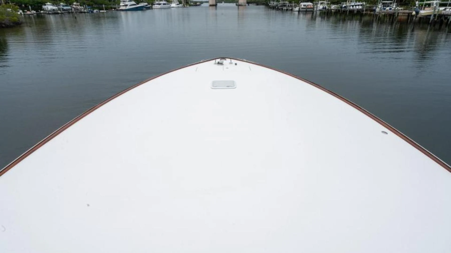 a large dam with a white surface aboard NEVER TOO LATE Yacht for Charter