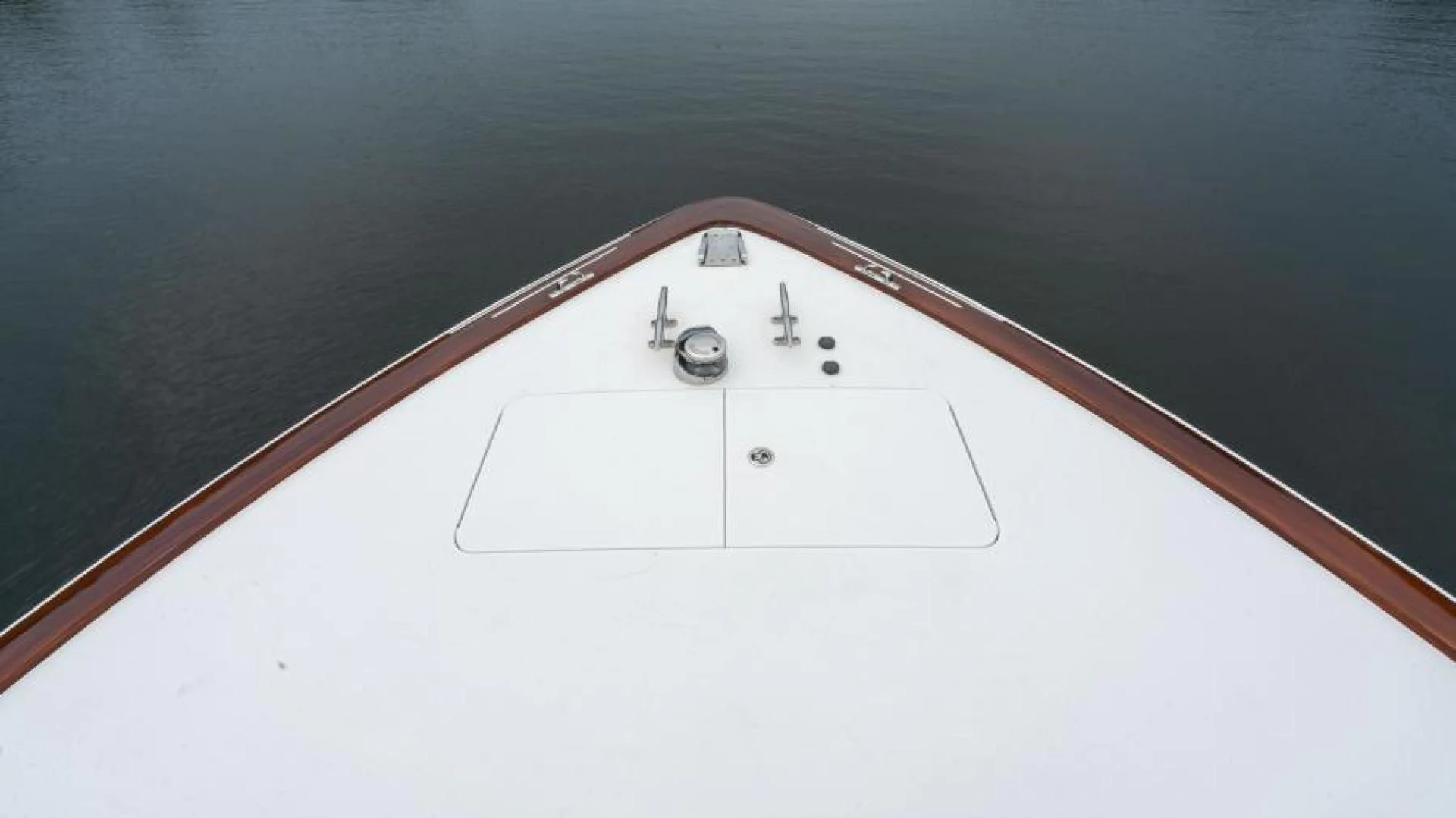 a close-up of a white electrical device aboard NEVER TOO LATE Yacht for Charter