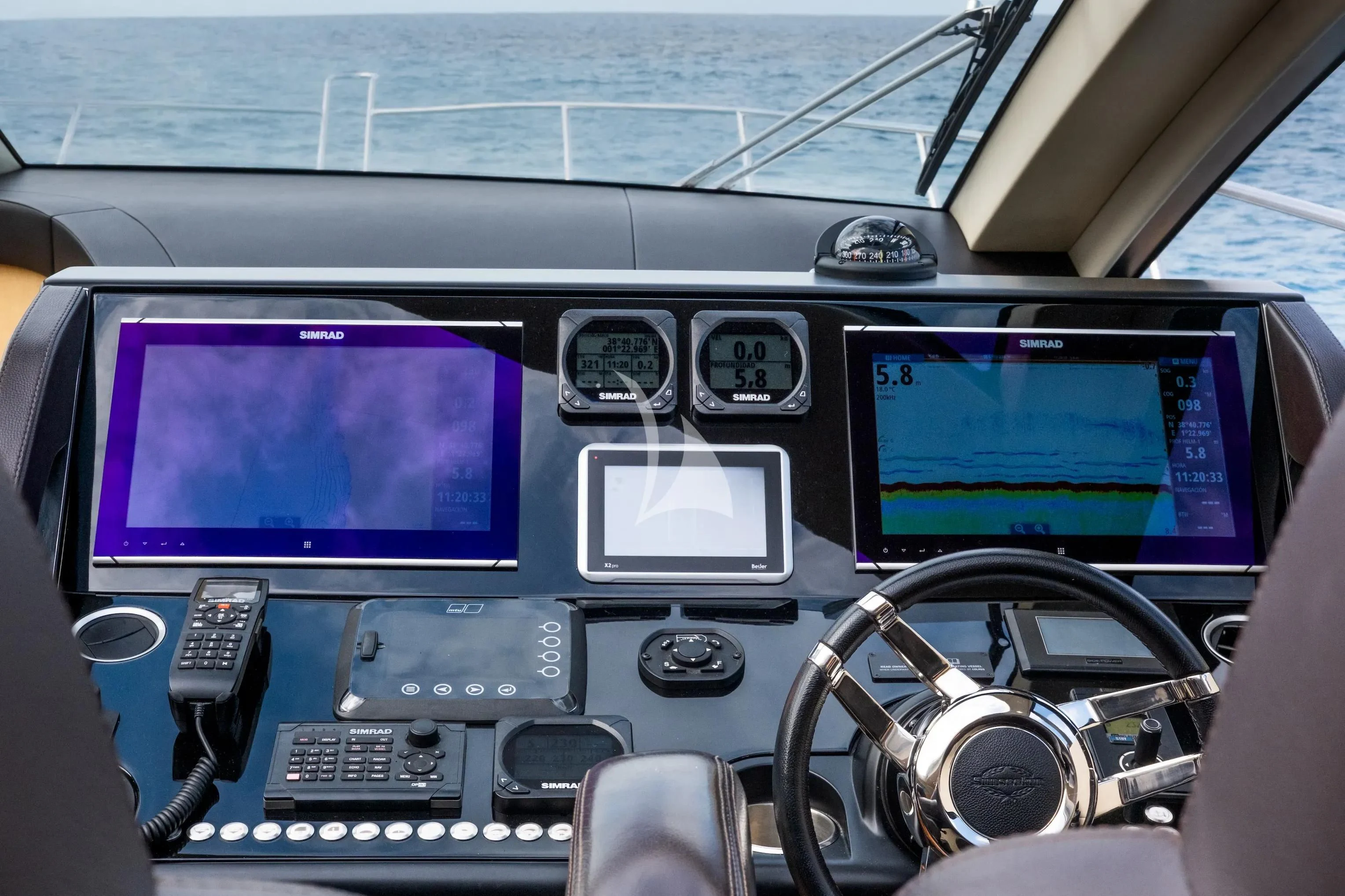 inside of a car aboard NEVER TOO LATE Yacht for Charter