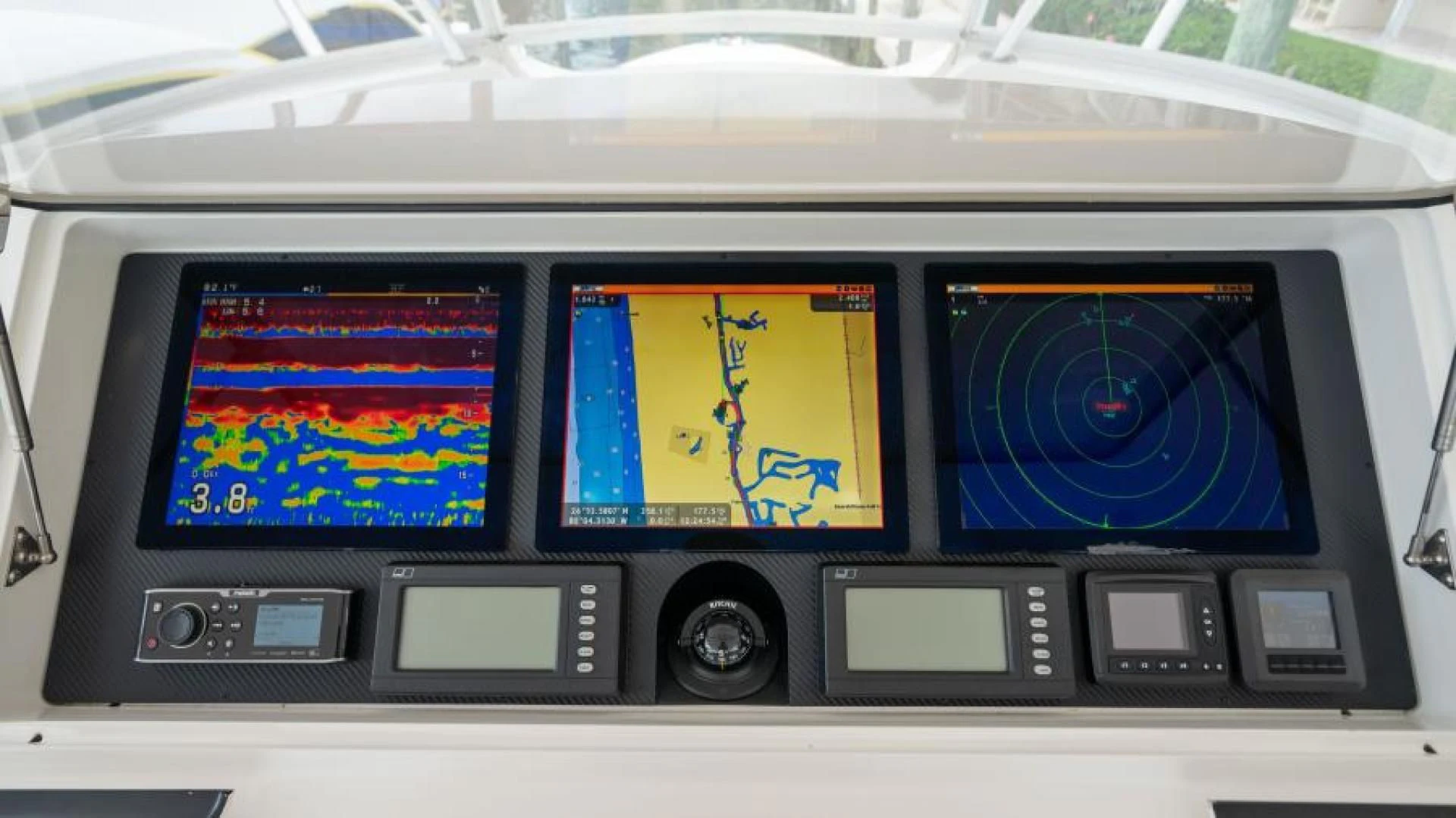 a display of a computer aboard NEVER TOO LATE Yacht for Charter