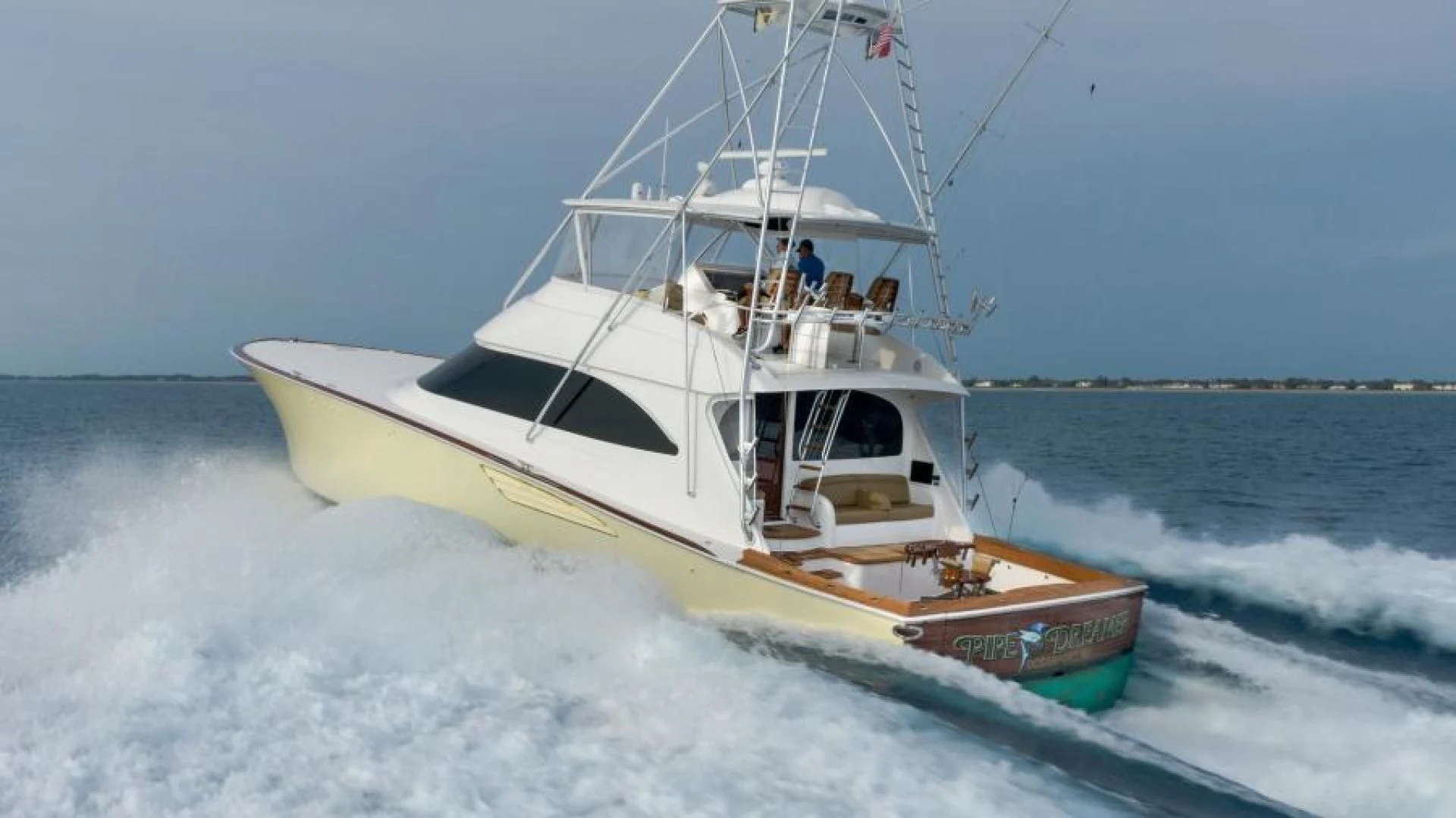 a boat on the water aboard NEVER TOO LATE Yacht for Charter