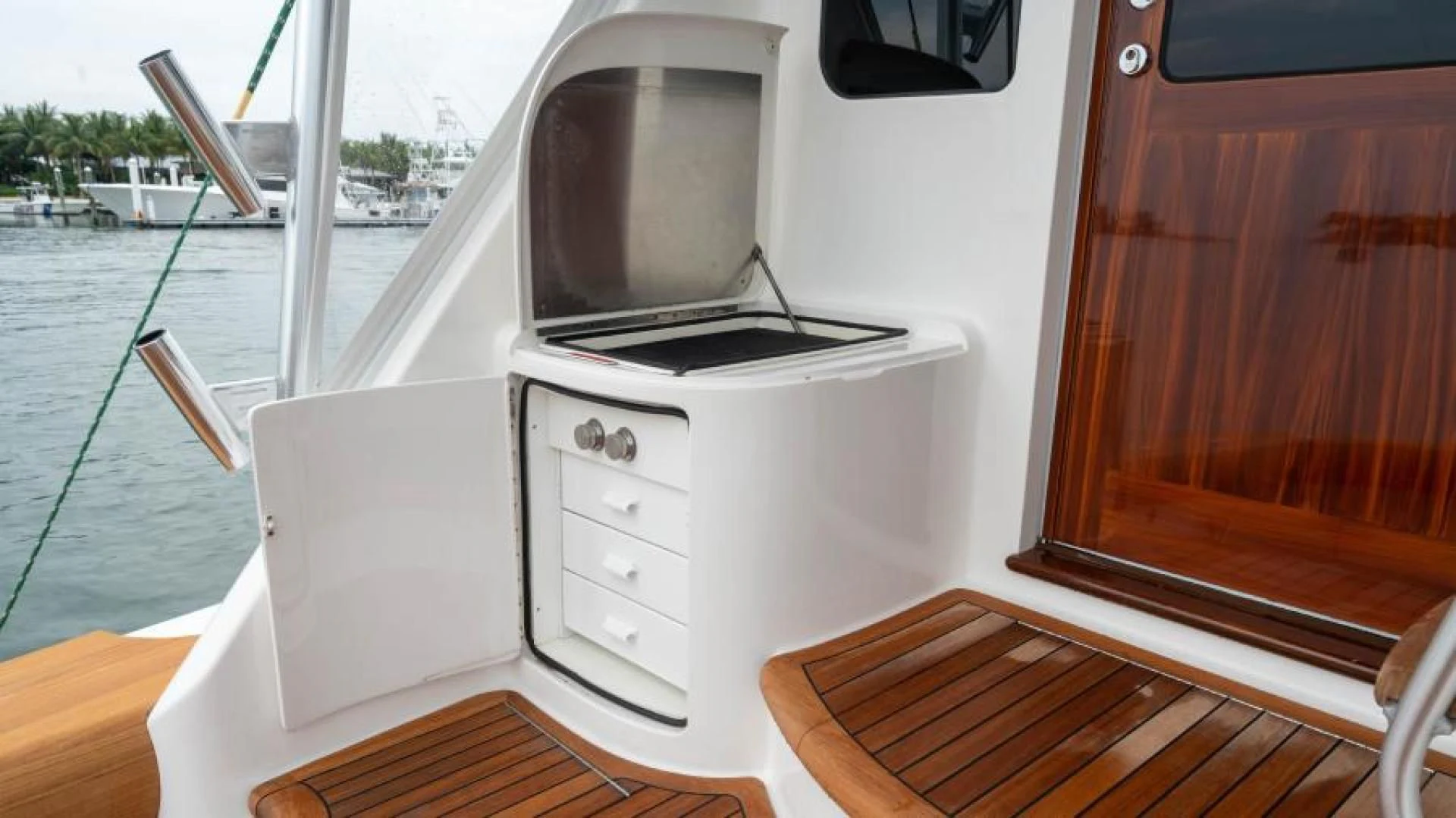 a white machine on a boat aboard NEVER TOO LATE Yacht for Charter