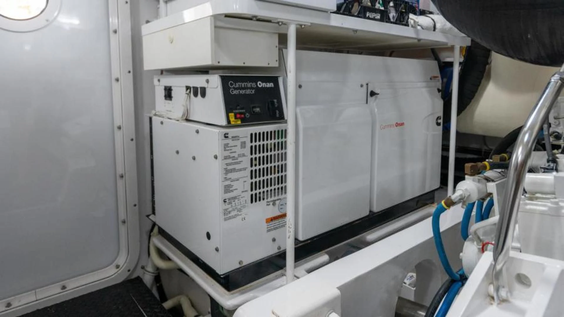 a machine with a blue tube aboard NEVER TOO LATE Yacht for Charter