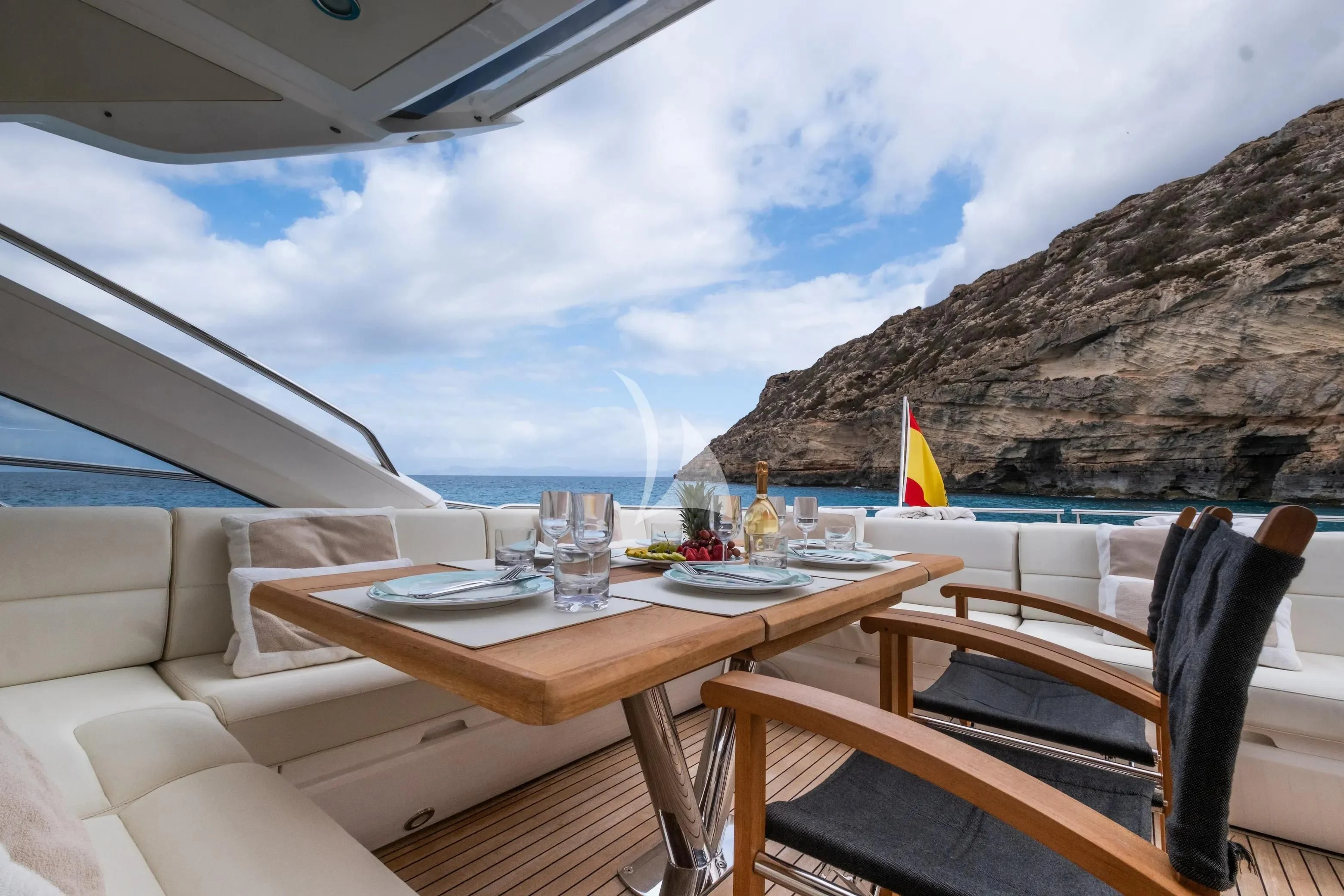 a table on a boat aboard NEVER TOO LATE Yacht for Charter