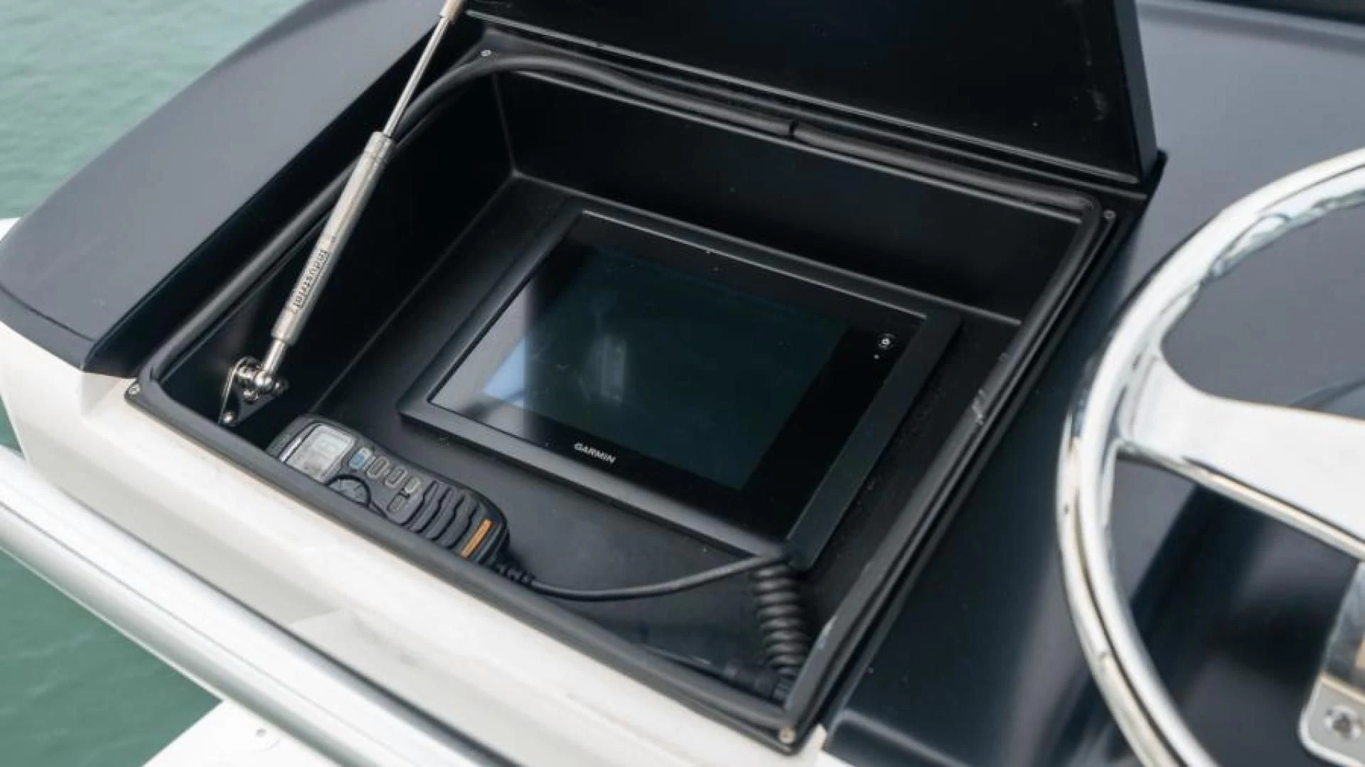 a close-up of a car aboard NEVER TOO LATE Yacht for Charter