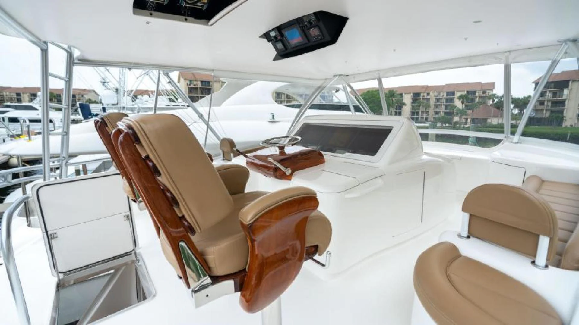 the interior of a car aboard NEVER TOO LATE Yacht for Charter