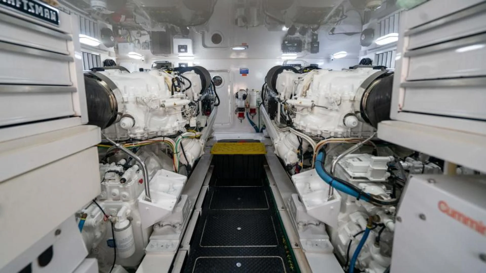 a large machine with a large piece of equipment in it aboard NEVER TOO LATE Yacht for Charter