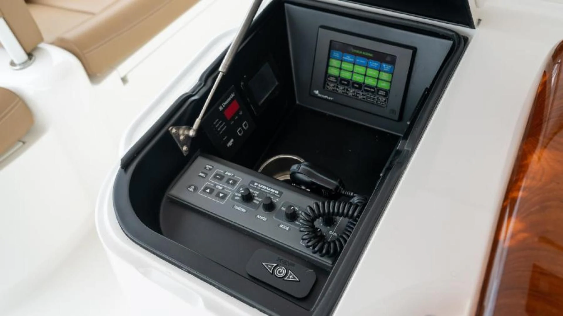 a black electronic device aboard NEVER TOO LATE Yacht for Charter