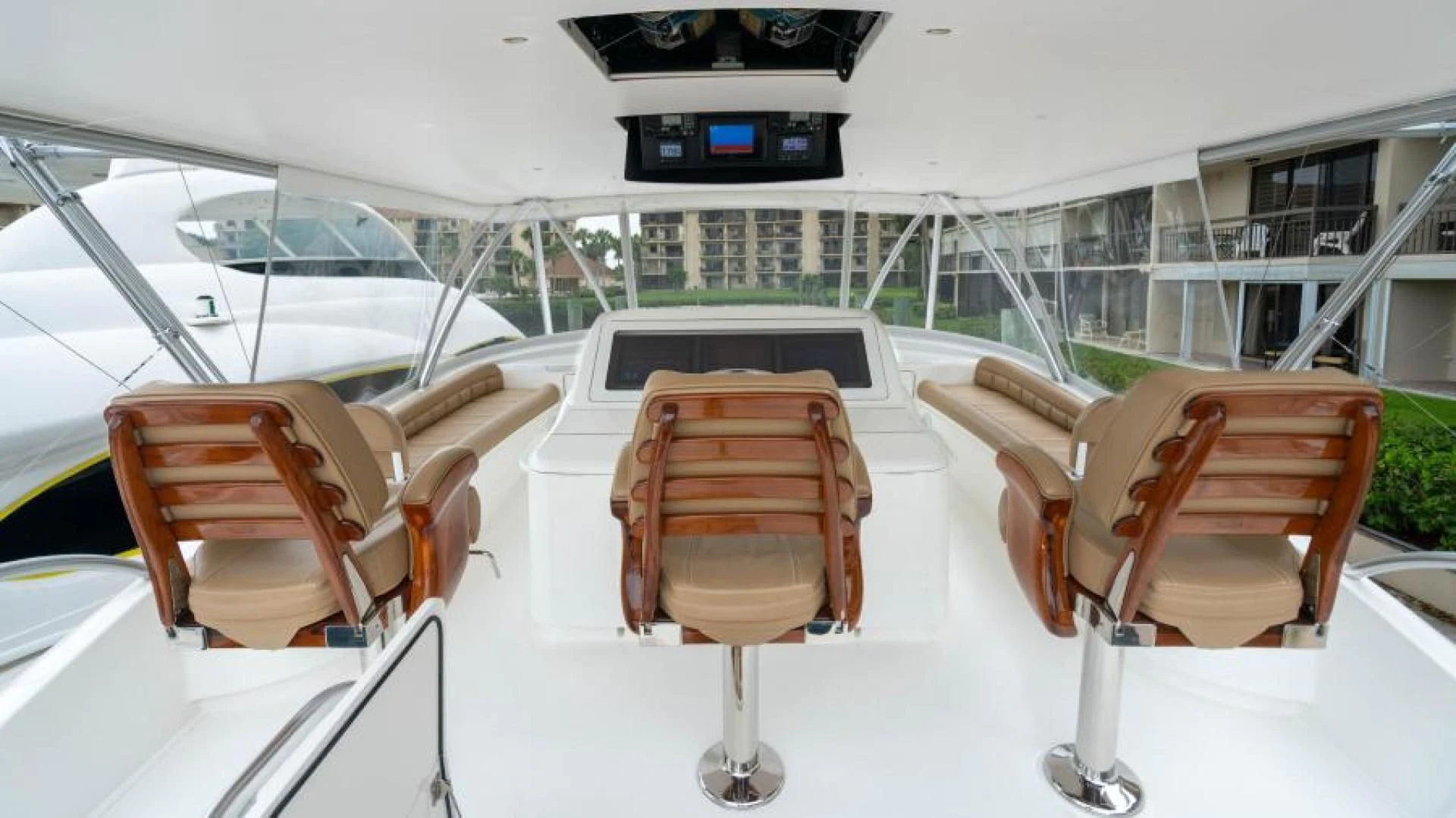 a group of chairs on a deck aboard NEVER TOO LATE Yacht for Charter