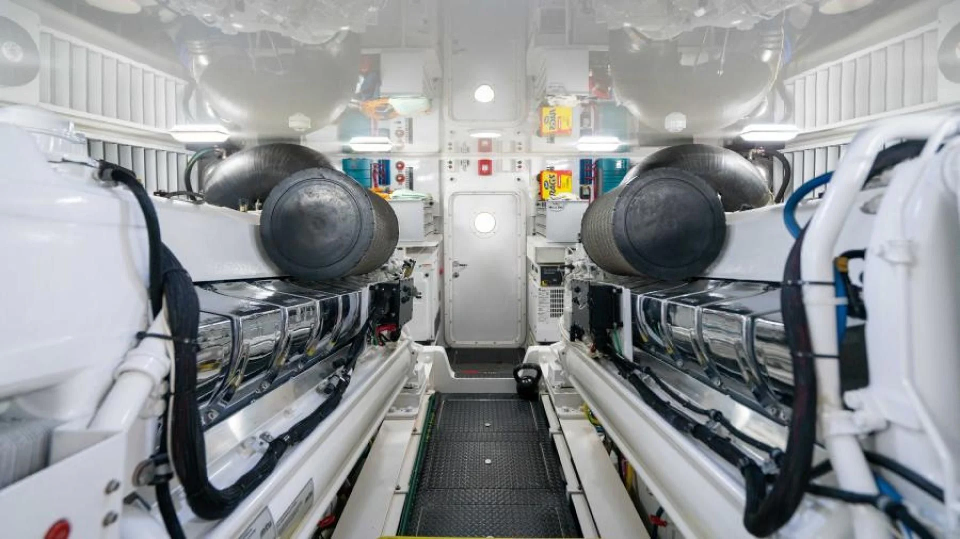 a room with several machines aboard NEVER TOO LATE Yacht for Charter