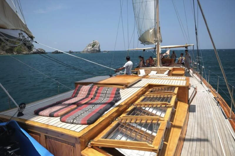 a boat with people on it aboard AVENTURE Yacht for Sale
