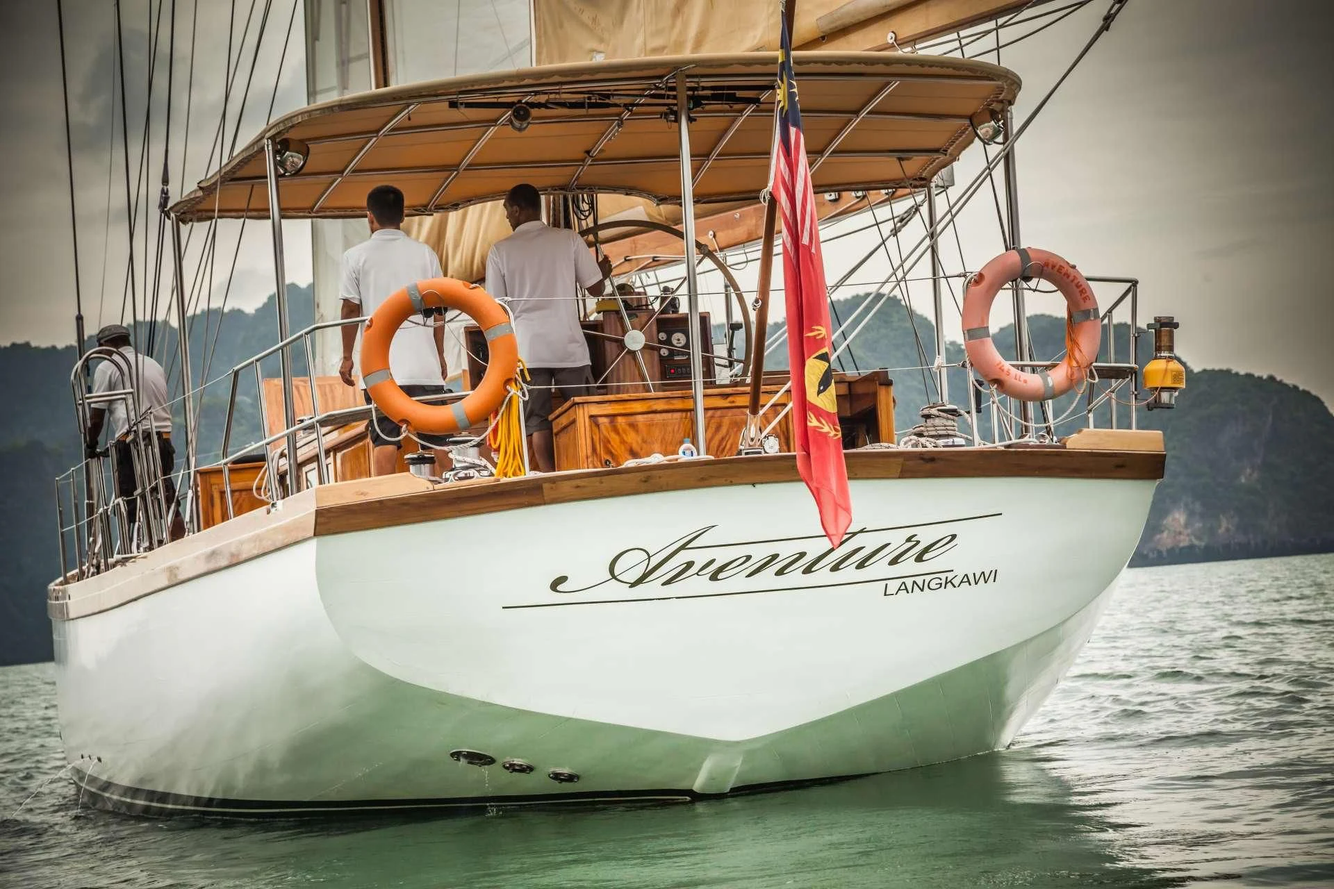 a boat with a sail aboard AVENTURE Yacht for Sale