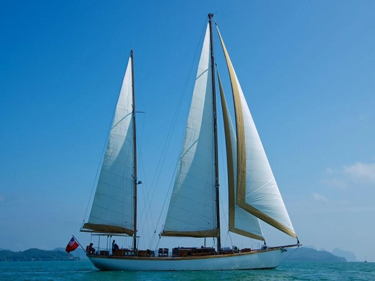 a sailboat on the water aboard AVENTURE Yacht for Sale
