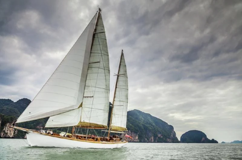 a sailboat on the water aboard AVENTURE Yacht for Sale