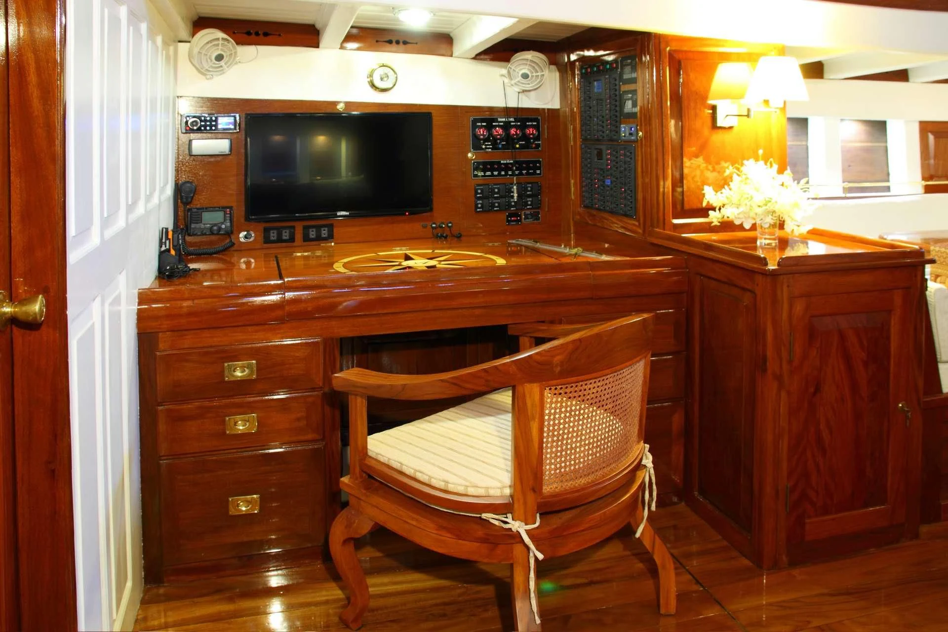 a kitchen with a bar and a bar aboard AVENTURE Yacht for Sale