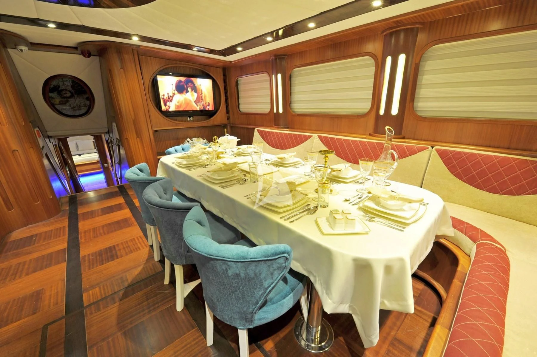 a dining table set for a family dinner aboard BERRAK SU Yacht for Sale