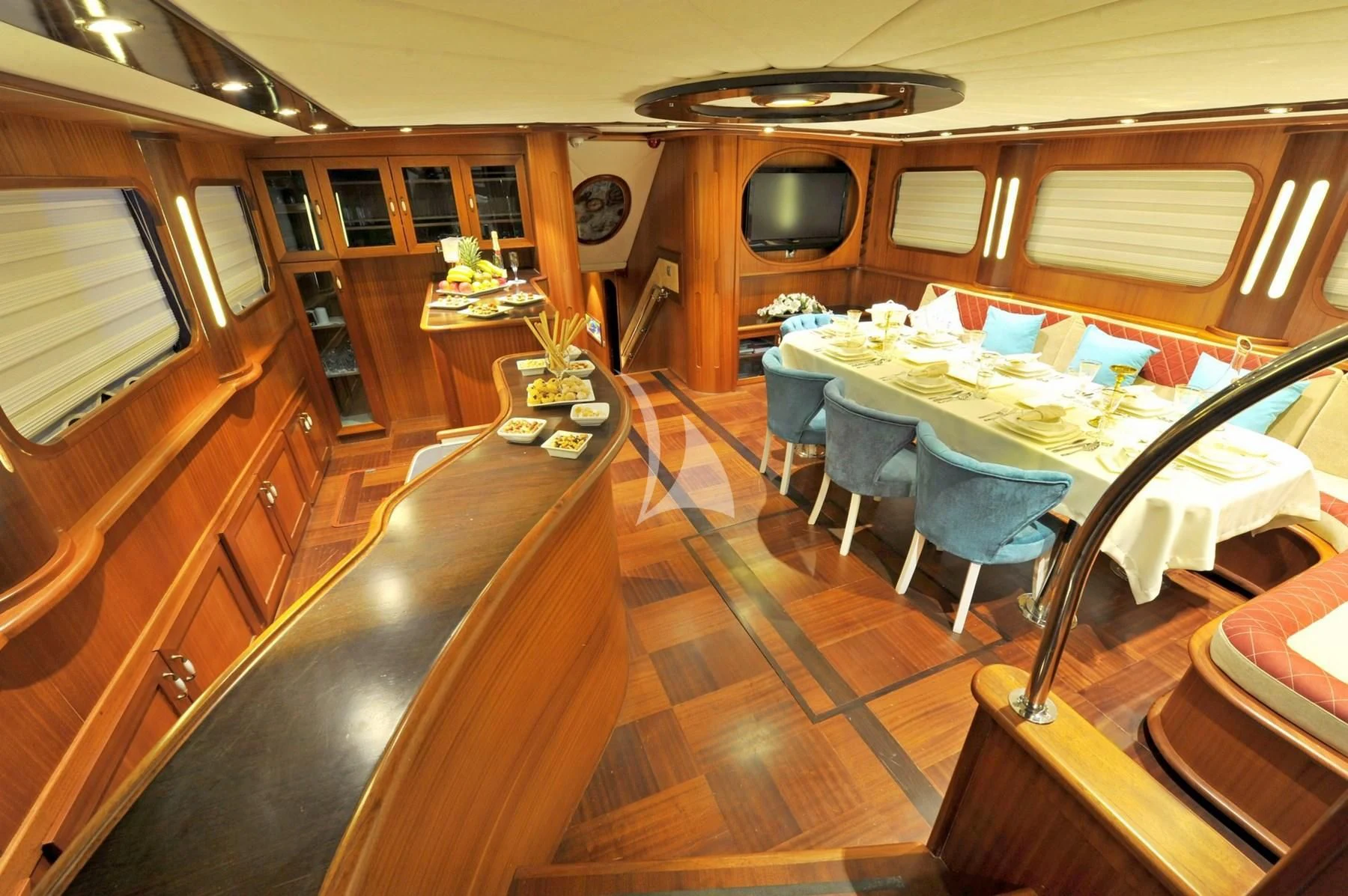 a kitchen with a dining table aboard BERRAK SU Yacht for Sale