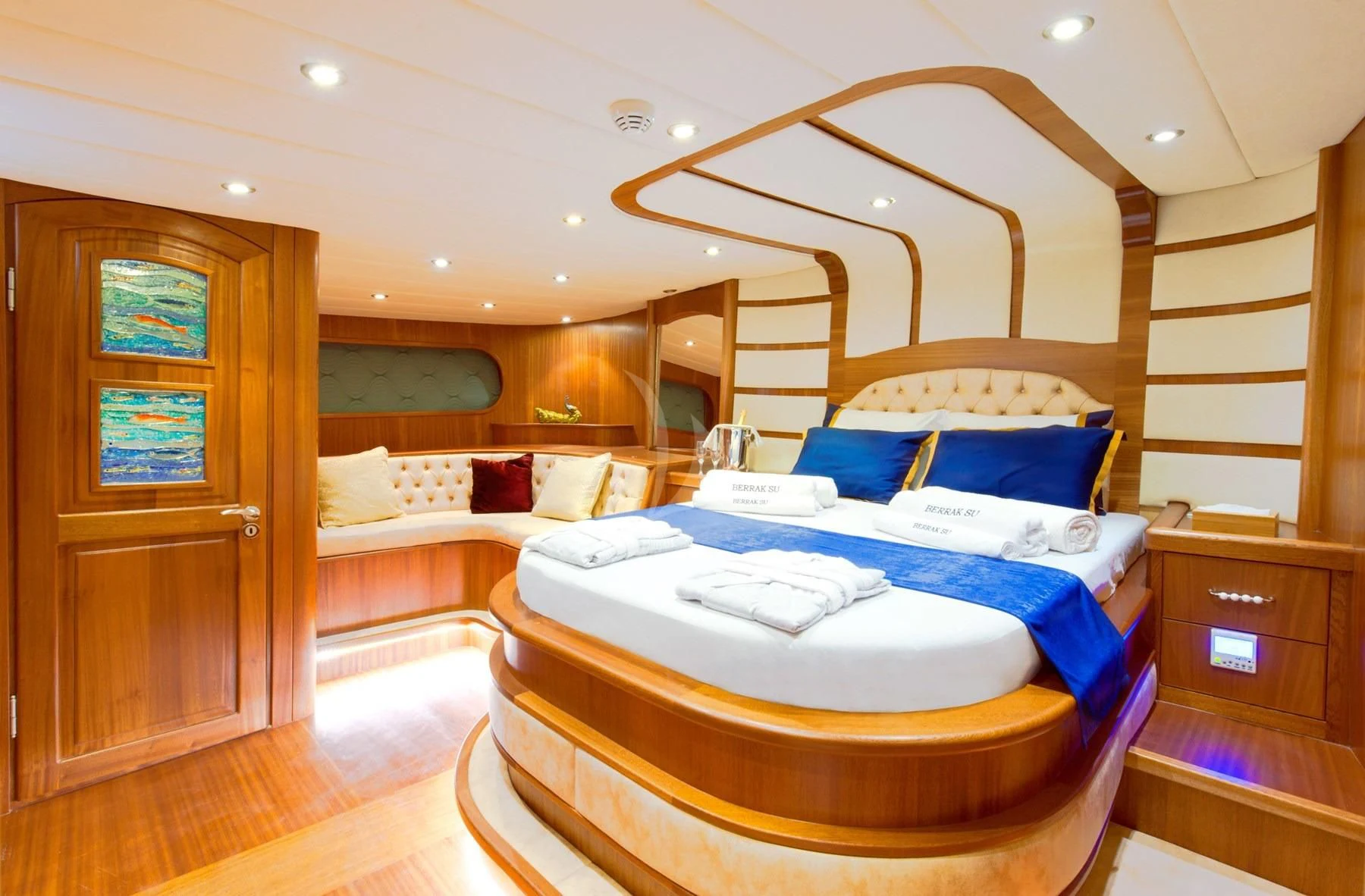 a room with a bed and a couch aboard BERRAK SU Yacht for Sale