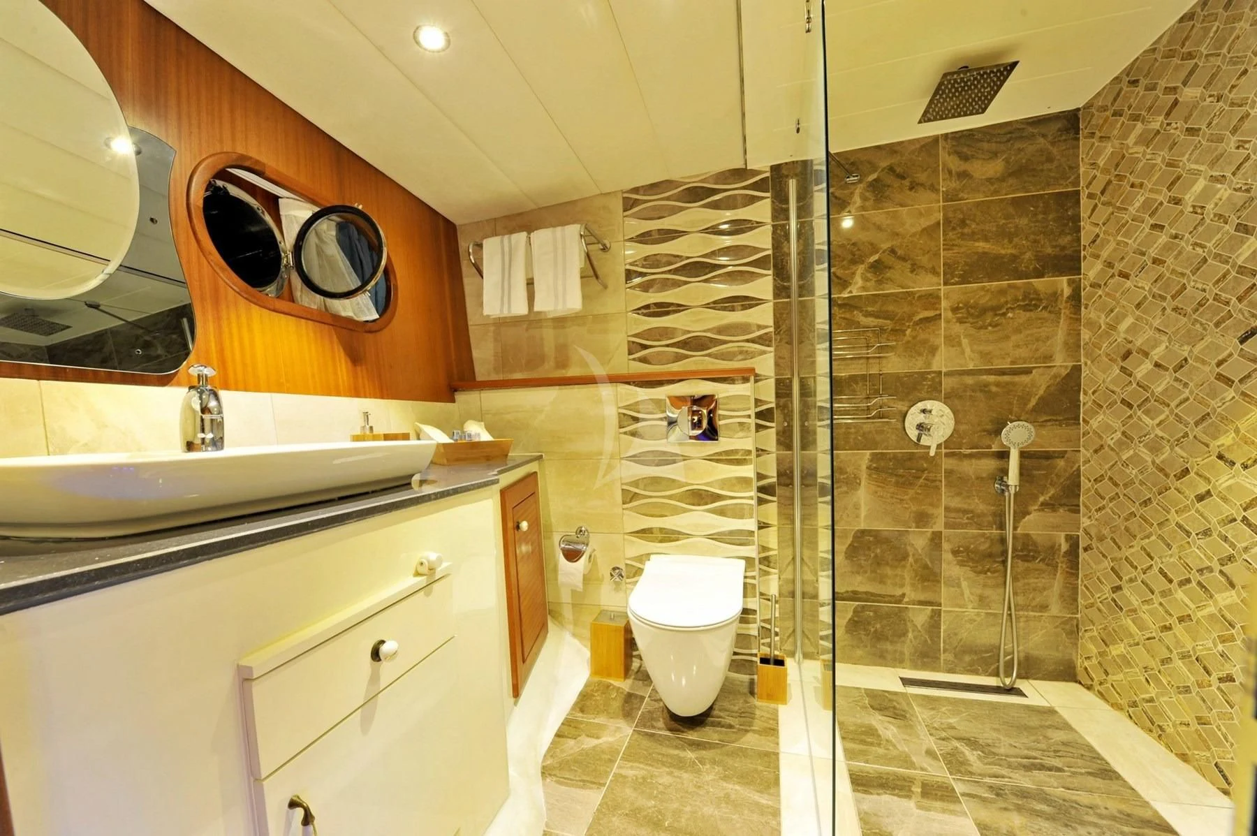 a bathroom with a glass shower aboard BERRAK SU Yacht for Sale