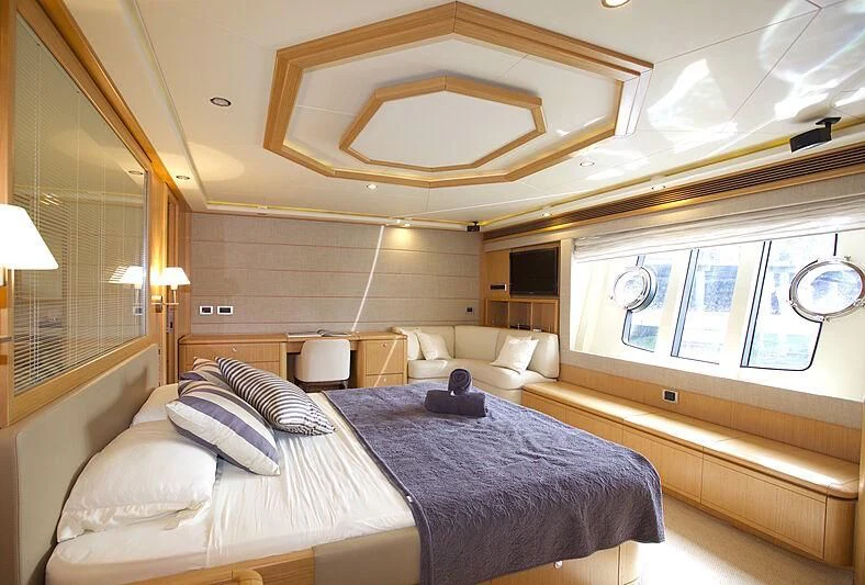 a large bedroom with a large bed aboard ST JUDE Yacht for Sale