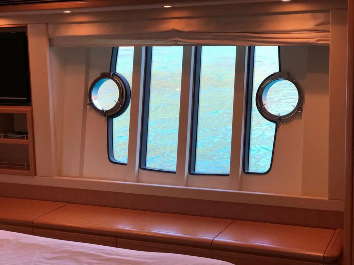 a room with a window and a bench aboard MAR AZUL Yacht for Sale
