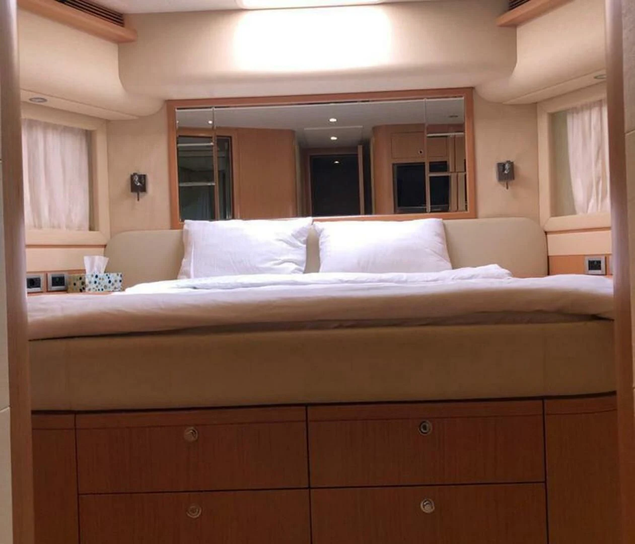 a bed with white sheets aboard MAR AZUL Yacht for Sale
