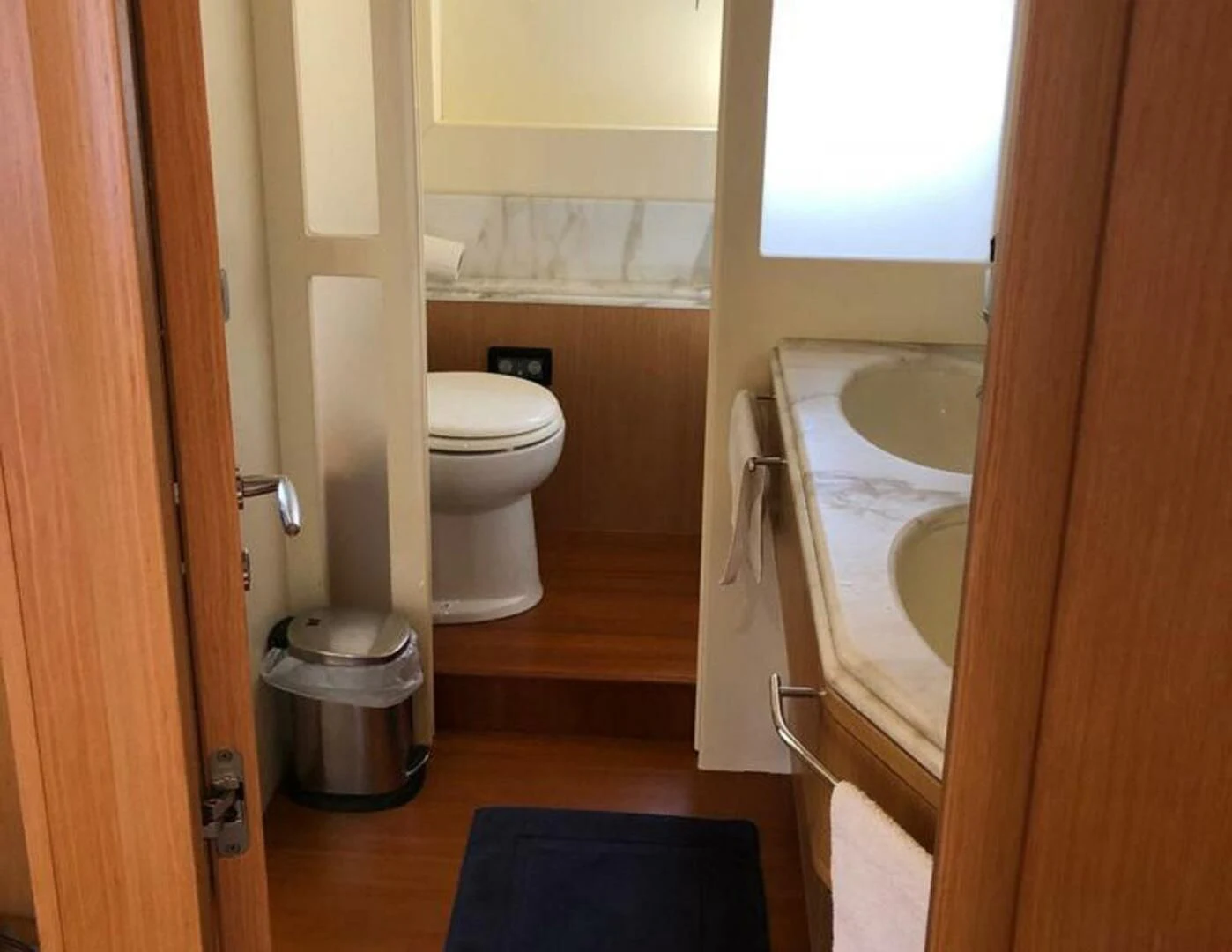 a bathroom with a sink toilet and tub aboard MAR AZUL Yacht for Sale