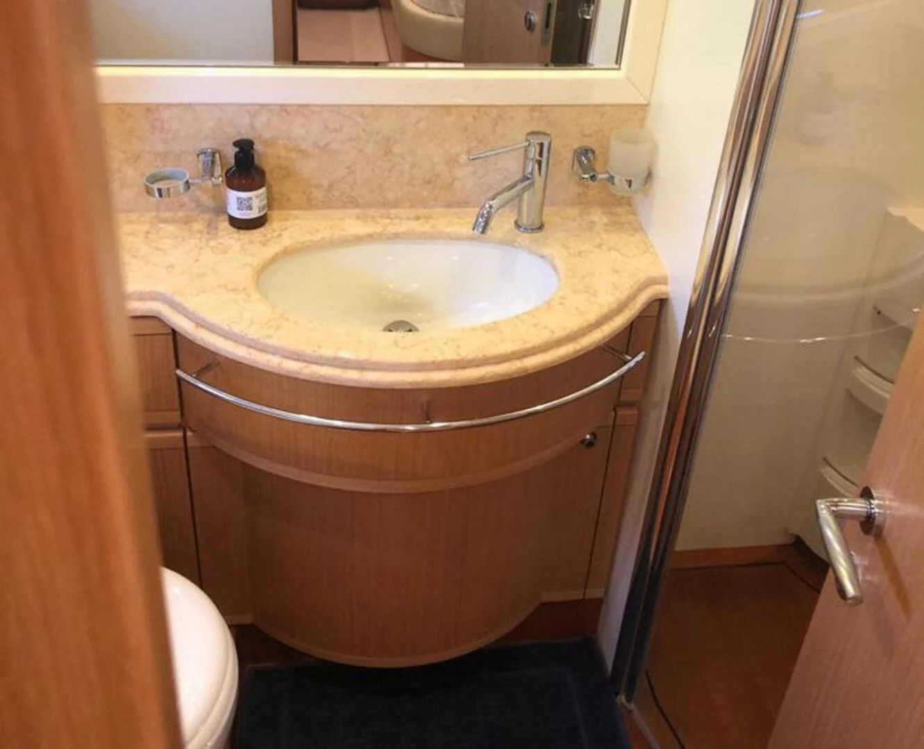 a bathroom sink with a mirror aboard MAR AZUL Yacht for Sale
