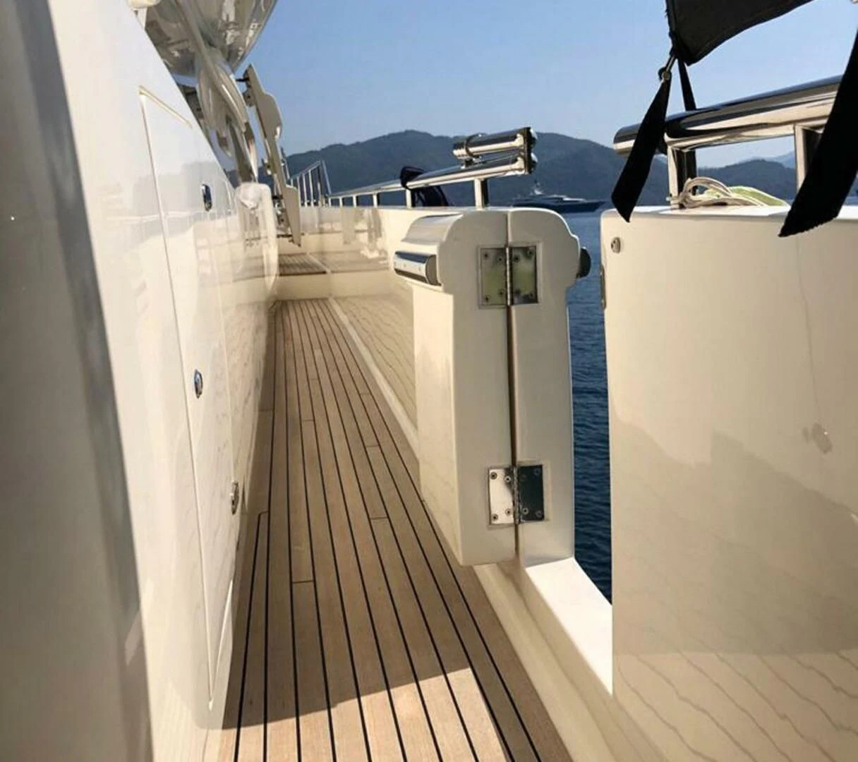 a large white machine on a wooden deck aboard MAR AZUL Yacht for Sale