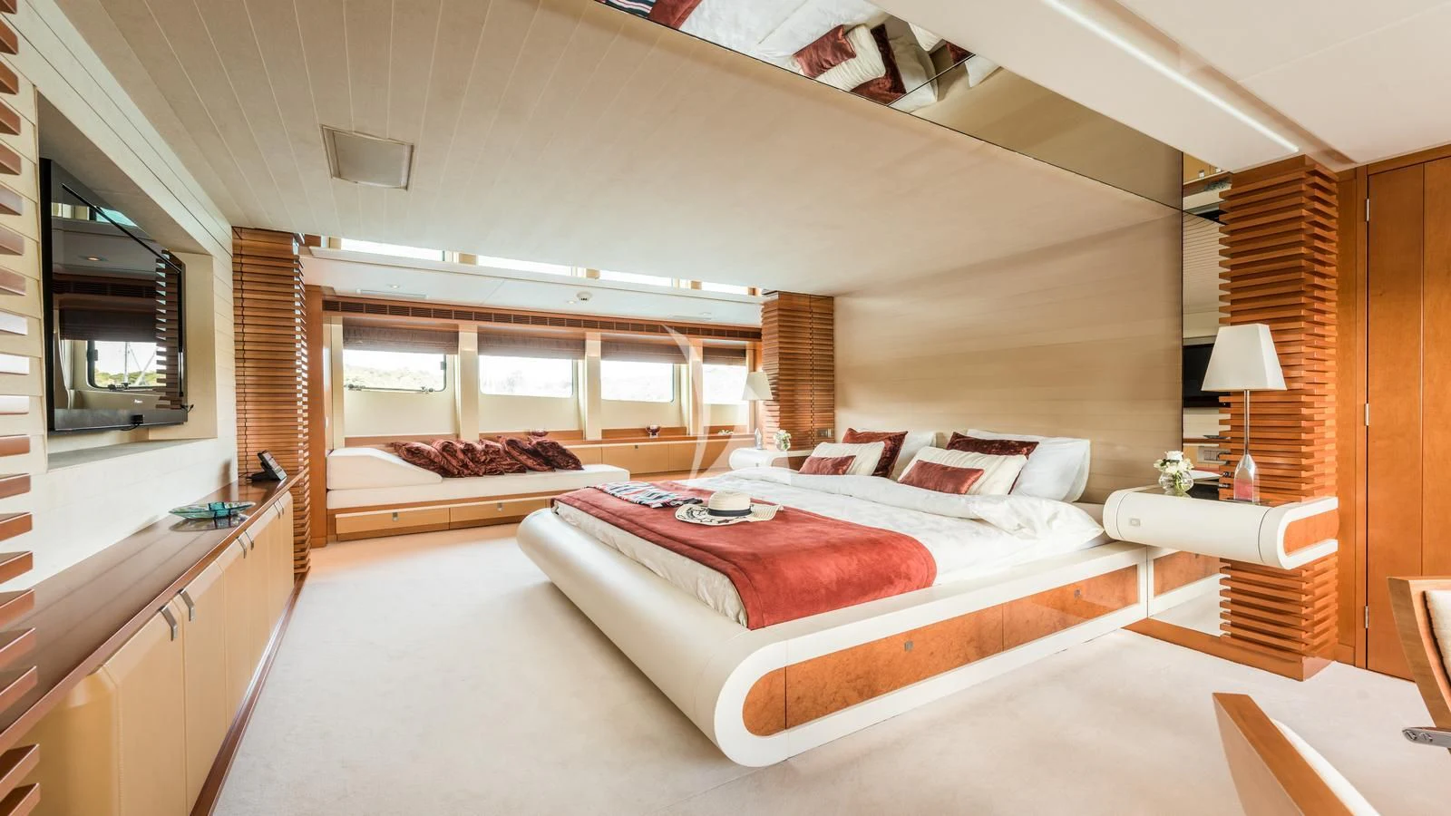 a large bedroom with a large bed aboard AGRAM Yacht for Charter