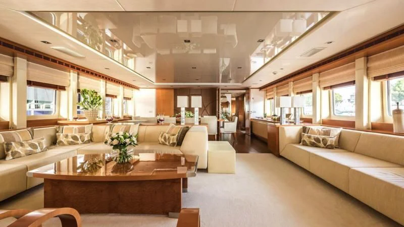 a living room with a couch and a table aboard AGRAM Yacht for Charter