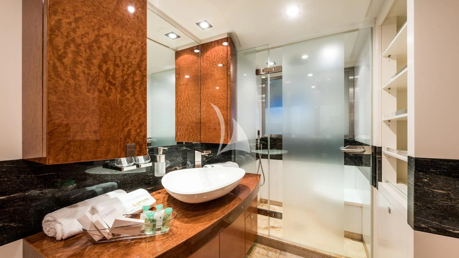 a bathroom with a sink and a shower aboard AGRAM Yacht for Charter